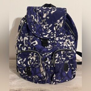 KIPLING Leopard Print nylon Backpack with monkey charm.